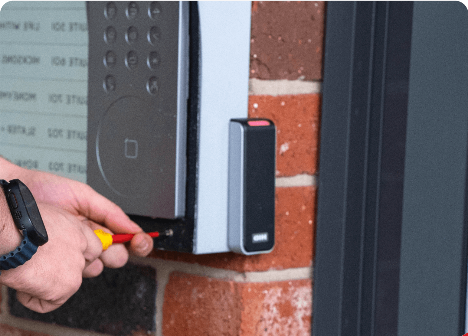 Access control card reader at a commercial entry